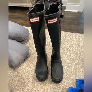Tall, black Hunter rain boots. Only worn a couple of times. Like new. Size 8.